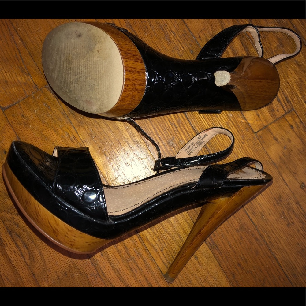 Black and wood heel size 6.5